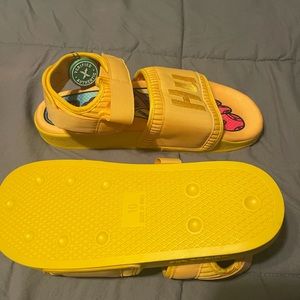 HU adilette sandals. Pharrell Williams